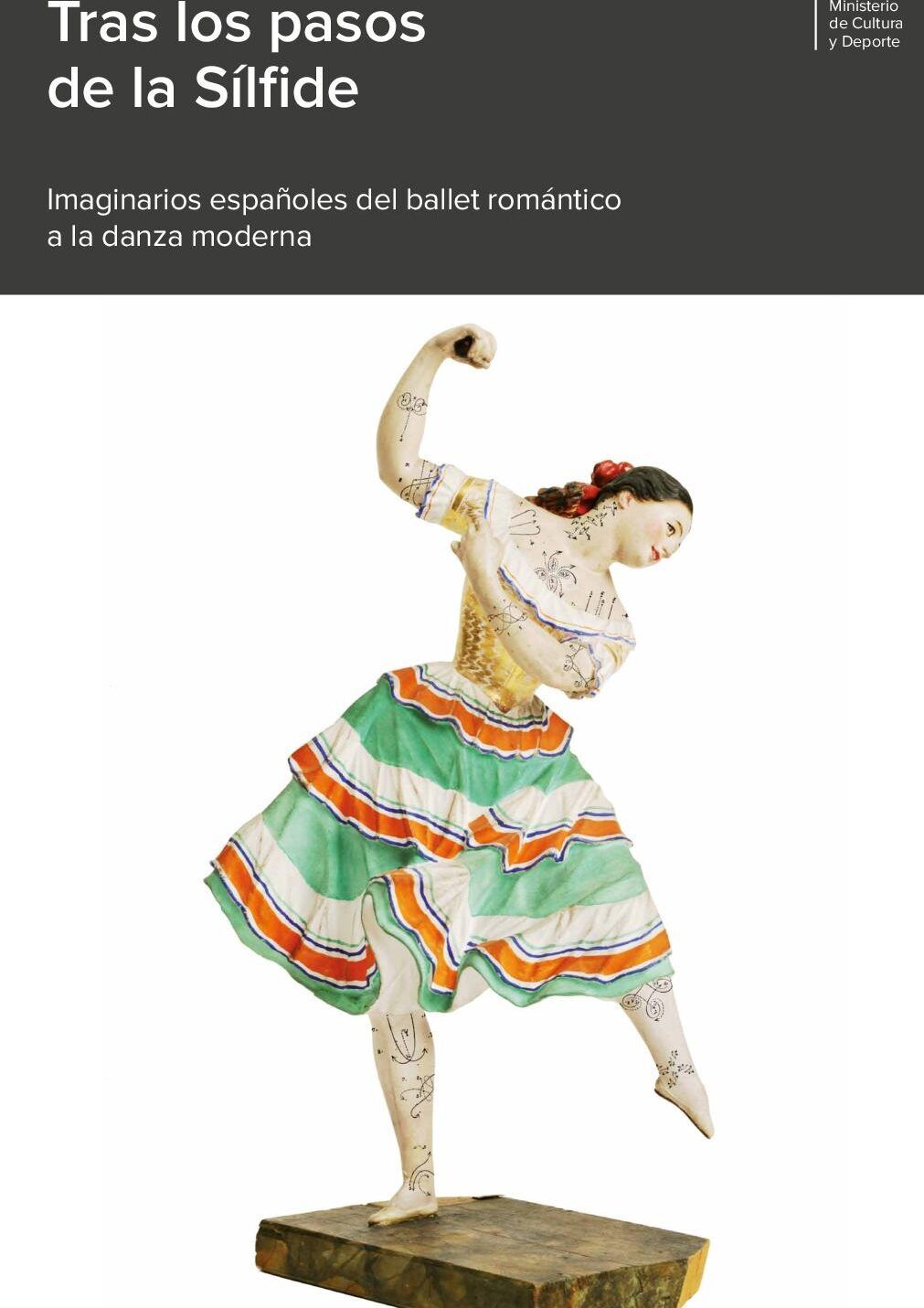 Figura de bailarina en pose dinámica sobre peana con falda verde y franjas, descubre el significado de pas de deux en el ballet clasico 1