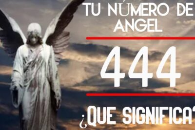 Estatua de ángel frente a un cielo nublado y el número 444, descubre el significado profundo de 444 en lo espiritual.