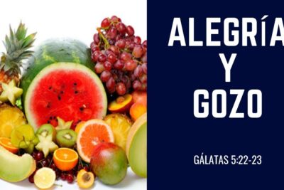 Cartel con fondo azul oscuro y texto ALEGRÍA Y GOZO junto a variedad de frutas tropicales fCNoQQq GW8