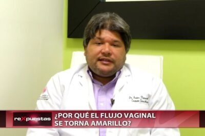 Médico en chaqueta blanca frente a cámara en segmento sobre flujo amarillo 1