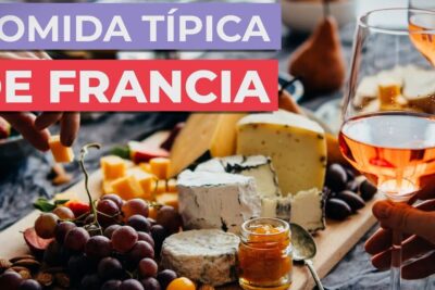 Tabla de quesos con uvas, mermelada y copa de vino rosado que comen los franceses descubre los secretos de la gastronomia francesa.