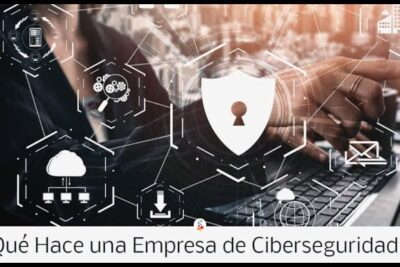 Manos sobre teclado con iconos de escudo, nube y red que es la ciberseguridad en empresas