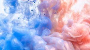 Tinta azul y rosa en movimiento que representa color verde limon