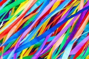 Cintas multicolores entrelazadas creando un patrón dinámico y vibrante, significado del color chocolate oscuro descubre su simbolismo y usos 1