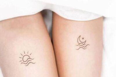 Tatuajes lineales minimalistas con sol y luna sobre olas, inspiración y significado y simbolismo de un tatuaje de escorpion en el hombro 1
