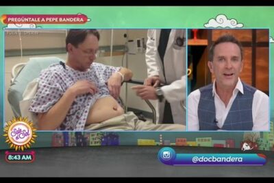 Paciente en cama de hospital siendo examinado por supuracion ombligo